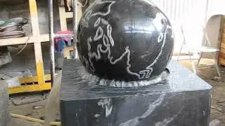 black granite globe fountain