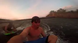 Sliding down a dam's spillway