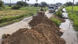 Just New Project!! 6-Wheel Dump Trucks & KOMATSU D31P Dozer Filling Flooded Land Next to the Road.