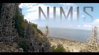 Climbing Driftwood Towers in Nimis