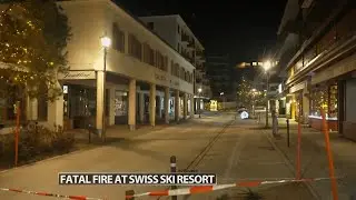 Swiss investigators believe sparkling candles atop wine bottles ignited fatal bar fire