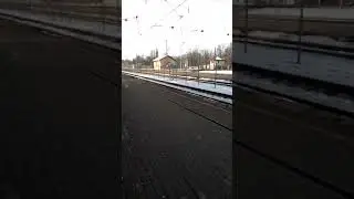 2ТЭ10М-3424 with mixed freight train passing station Ogre. (15:25)