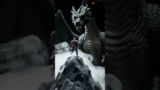 A fantasy knight action figure climbs a foam mountain stabbing his sword into the surface for grip