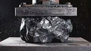 Pressing a snow globe with a tiny house inside &mdash; glass, snow, and water bursting outward.