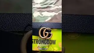 Brendan Rodgers unboxing a Gucci belt