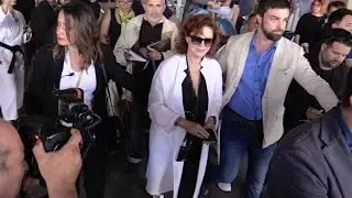 Actress Suzanne Sarandon arriving in Cannes airport in a chaos