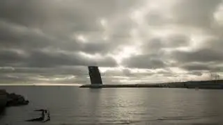 Timeplase of a cloudy day in Alges, Portugal