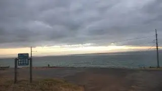 Восход солнца над Гленкэрном, через военно-морскую базу Ред-Хилл-роуд и в Скарборо в январский день.