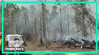 Firefighters continue to battle 2 massive wildfires in Florida Panhandle