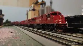 CP Grain train with SD70ACU, SD60M, and SD40-2
