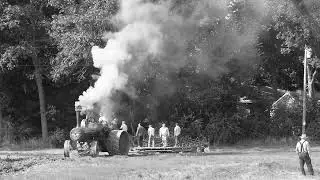 Very Old Case Steam Tractor Working In The Fields At The Rock River Thresheree