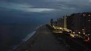 OC condos at dusk, drone pan