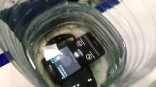 Проверка телефона на влагостойкость Kyocera (Япония) IP-57.