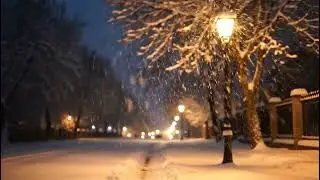 Winter Night Snowfall Under Street Light With Cinematic Mood And Calm Atmosphere Video