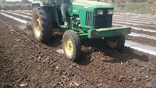 Jhon deer tractor Preparation bed mulching paper  agreeculture chilli, tomato