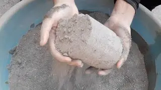 Reused cement soft dusty dry and water pouring crumbling in tub mixing