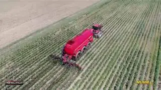 9000 US GAL Manure Tank Injects Manure In Organic Corn Field