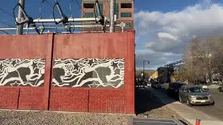 Large electric Substation, artistic walls with murals, quotes as well as Native American language