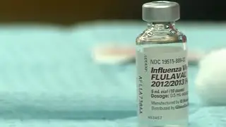 Health Experts Encourage People to Wear Masks Amid Spike in Flu Cases
