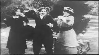 Syden Chaplin Gussle Caught in a park 1915