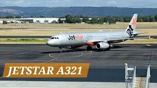 JETSTAR Airbus A321 arrival at Adelaide Airport terminal