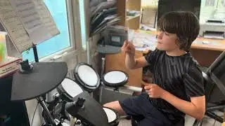 Child drumming| Dainton Anderson