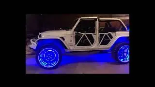 Custom Jeep JL built by underground autostyling sitting on 26&rdquo; Forgiato wheels with 37&rdquo; mud tires .