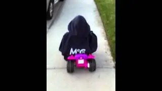 Our Little E.T. on her four wheeler