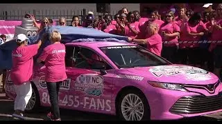 NASCAR stars paint the wall pink at Charlotte Motor Speedway