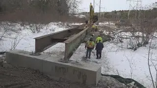 Snowmobile club gets big boost from community to build bridge