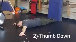 Prone Y Scorpion Biceps Stretch