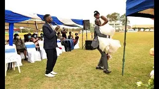 How groom carried the bride on their wedding day.
