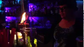 Sierra lighting a Tiki Cocktail on fire at Hale Pele Portland OR