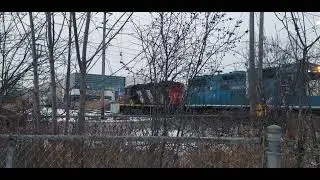 CN L551 EMD GP38-2 4910 & GP9RM 4125 are picking up the Tank cars in The Glasslead Industrial 