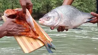 Bigg fish  tandoori/grill cooking in forest River side