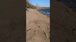Walking along Lake Harriet North Beach on a windy day in April.