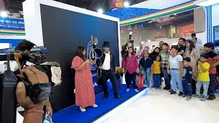 Magician performing at Government Pavilion at IITF 2024