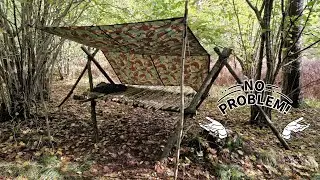 BUSHCRAFT  how to make a raised bed Shelter