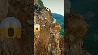 Excavator lifting the huge rock #shorts