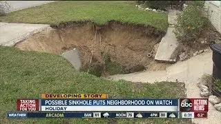 Pasco Fire Rescue responds to sinkhole that eats part of driveway in Holiday
