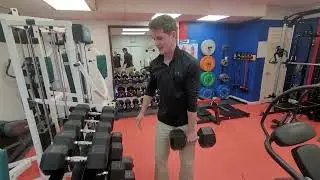 Matt with some quick one arm bent over row. Practical strength for starting that lawnmower, Hehe