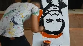 Un peintre égyptien crée des portraits à l'envers à la vitesse éclair [No Comment]