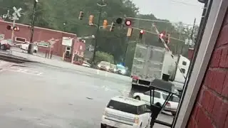VIDEO: Train tears through truck in Villa Rica, Georgia