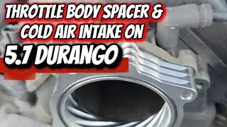 Installing a throttle body spacer on a 5.7 HEMI Dodge Durango