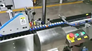 Vials labeling +trays inserting system +camera inspection +vertical to horizontal feeder
