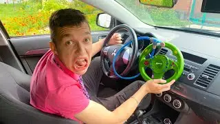 Yellow Man took steering wheel of Russian Mini Cooper and stuck it in steering wheel Lancer X 13+