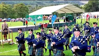 Vale of Atholl Pipe Band opening march at 2025 Pitlochry Highland Games in Perthshire, Scotland