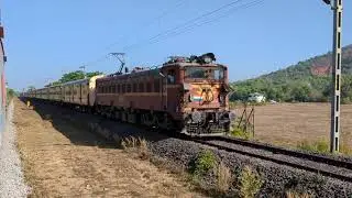 Off-link BSL WAG-5 led 12133 crosses 01595 Karwar - Madgaon Special at Asnoti