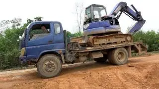 Excavator climb on truck [123 Tech]
