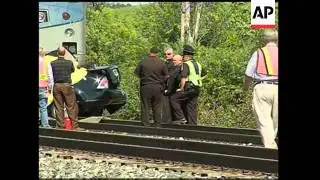 Five killed in car hit by train at crossing